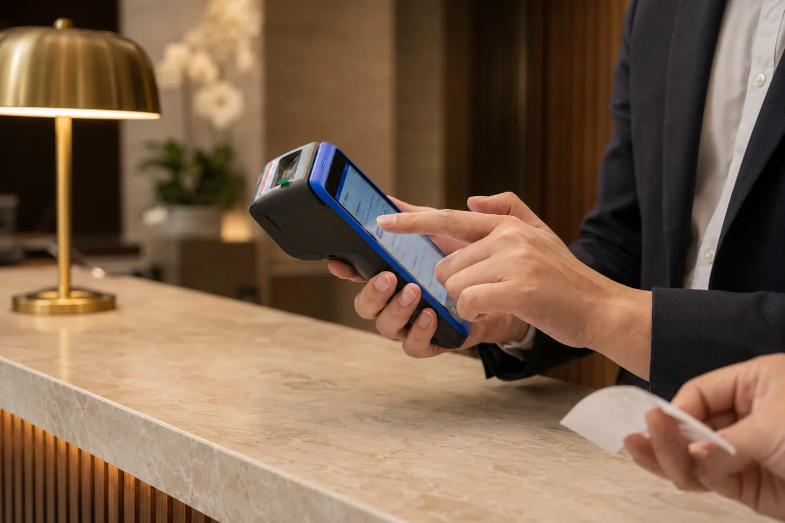 Paying at a hotel reception